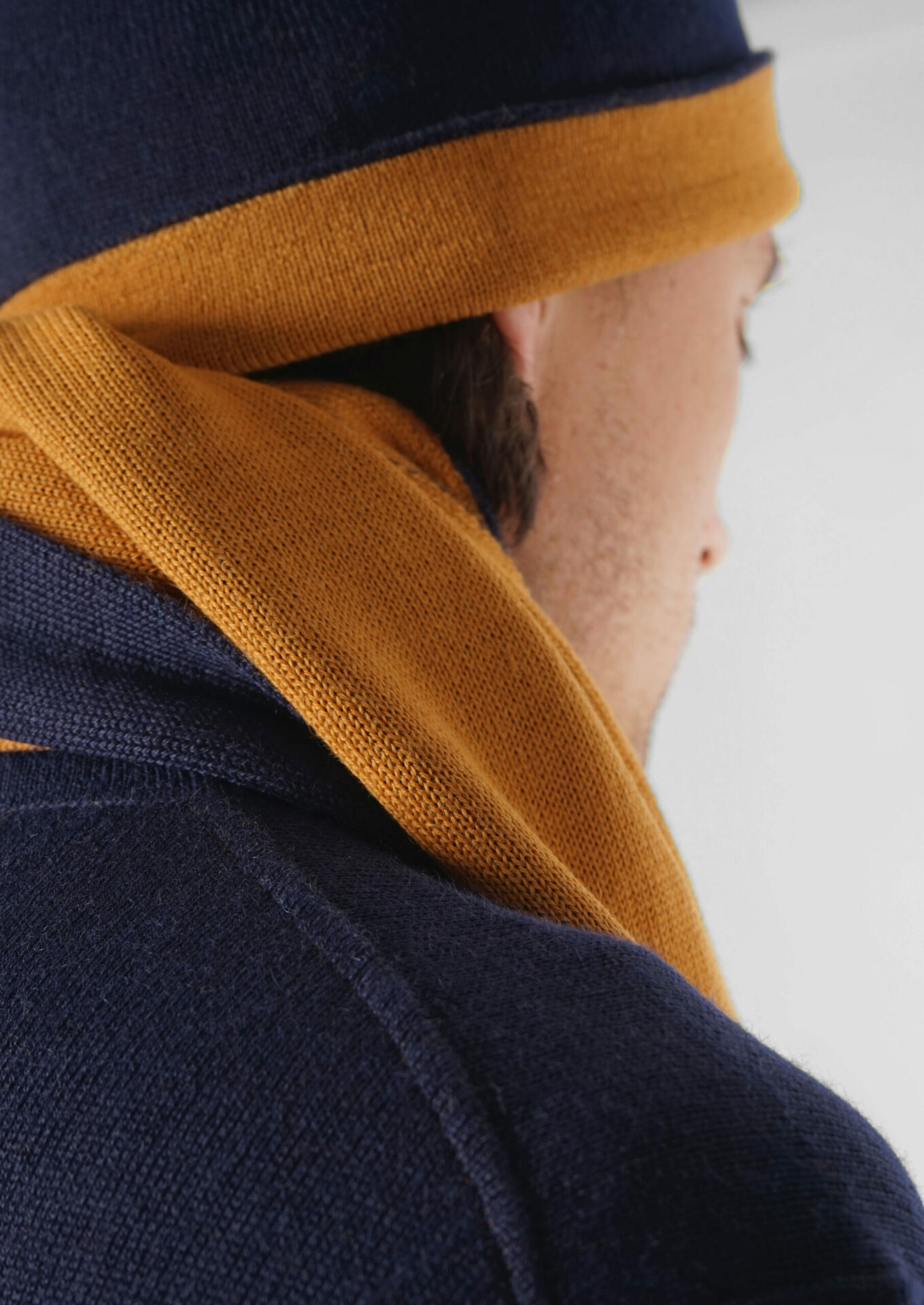 Product image for »Blauaras Ochre« Reversible Beanie Baby Alpaca | Ochre Navy