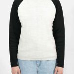 Varsity Baseball Sweater in Black and Ecru made of 100% natural Alpaca. Designed by R.EH in, made fair in Peru.