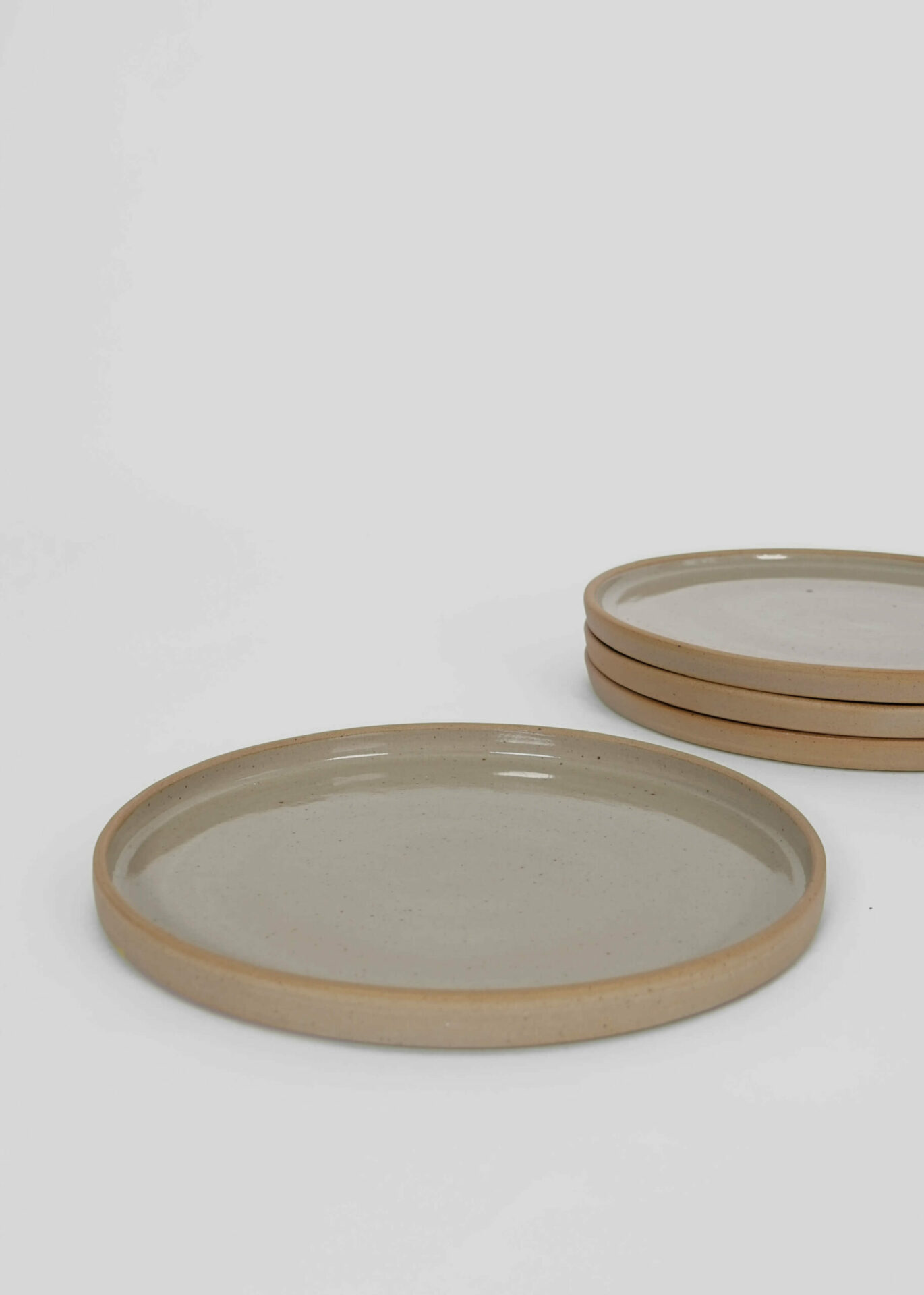 Unglazed / Glazed Grey Stoneware Plate 22cm with a high rim. Handmade, signatured ceramic piece by REH (GERMANY) based in Berlin.
